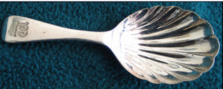 A close-up of a coin

Description automatically generated with low confidence