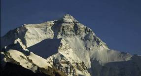A mountain with snow on top

AI-generated content may be incorrect.