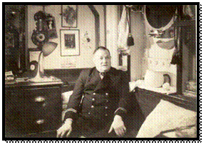 A person in a uniform sitting in a room

AI-generated content may be incorrect.